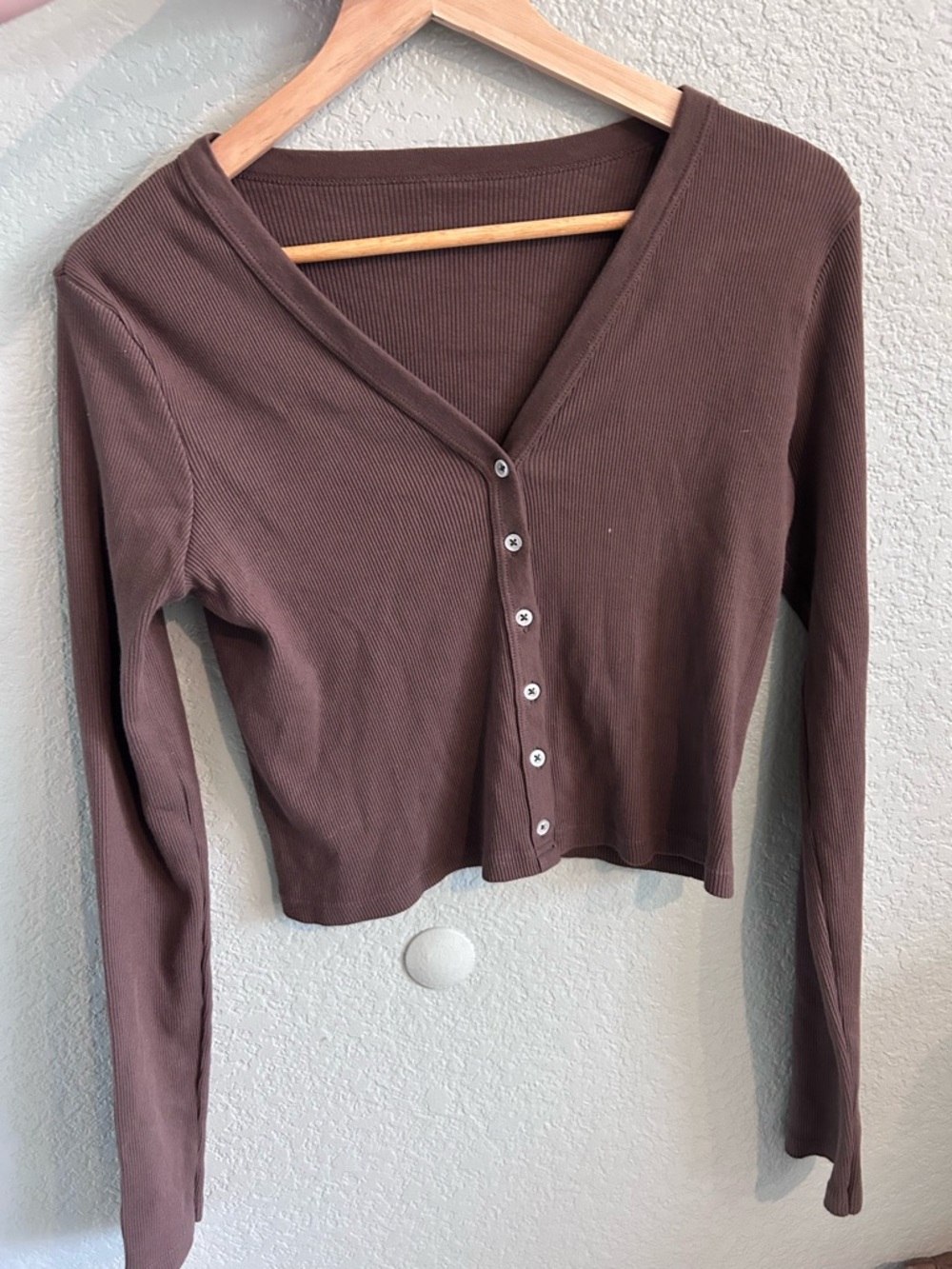 Brown Shirt 
Size Unknown but fits a size Small